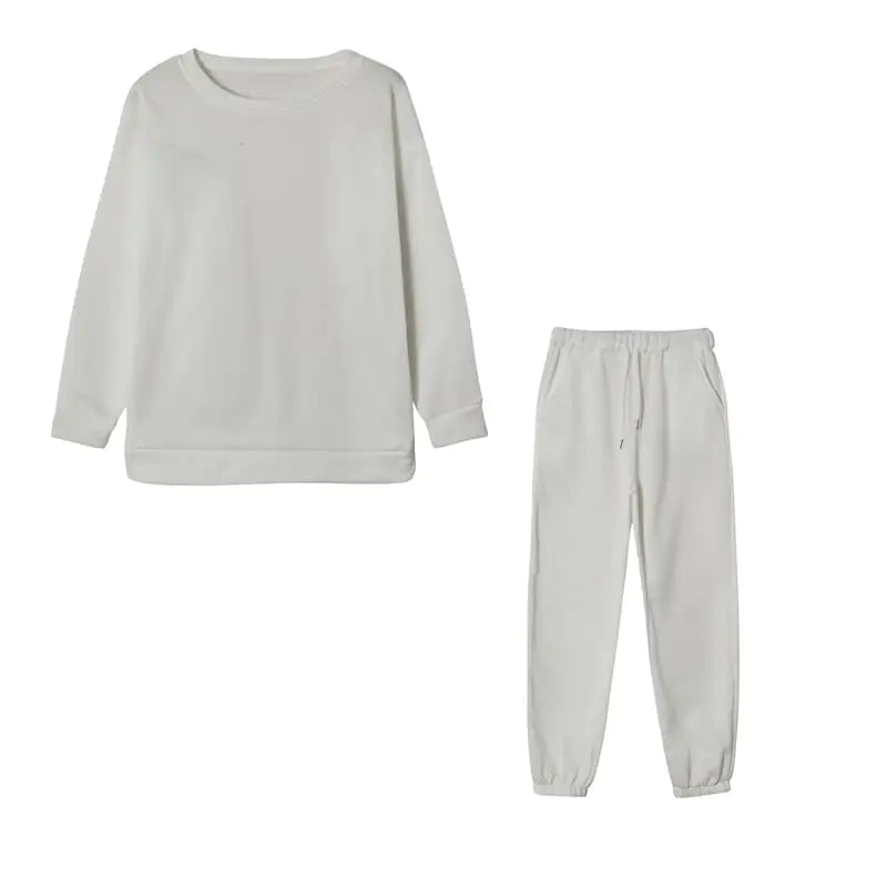 Conjunto deportivo de dos piezas con capucha en color sólido