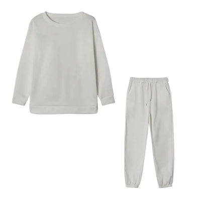 Conjunto deportivo de dos piezas con capucha en color sólido