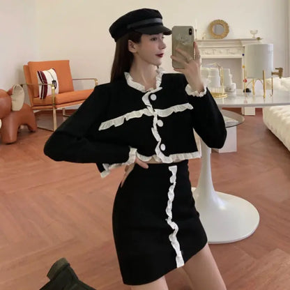 Conjunto elegante de dos piezas con detalles de volantes