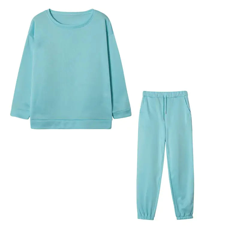 Conjunto deportivo de dos piezas con capucha en color sólido